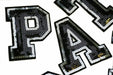 Black and silver sequin iron on patch letters P A T 