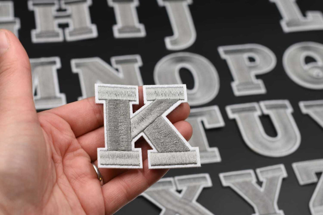 Grey Embroidered 5.5cm Iron On Patch Letter K