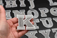 Grey Embroidered 5.5cm Iron On Patch Letter K