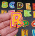 Kids Range Embroidered Art Attack 3.5cm Iron-On Patch Letter R